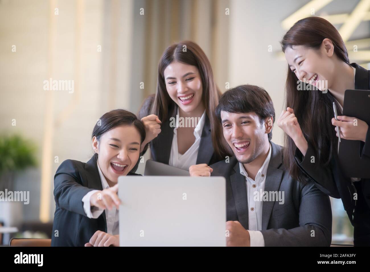 Young Asian business people are meeting in office . Group of Business ...