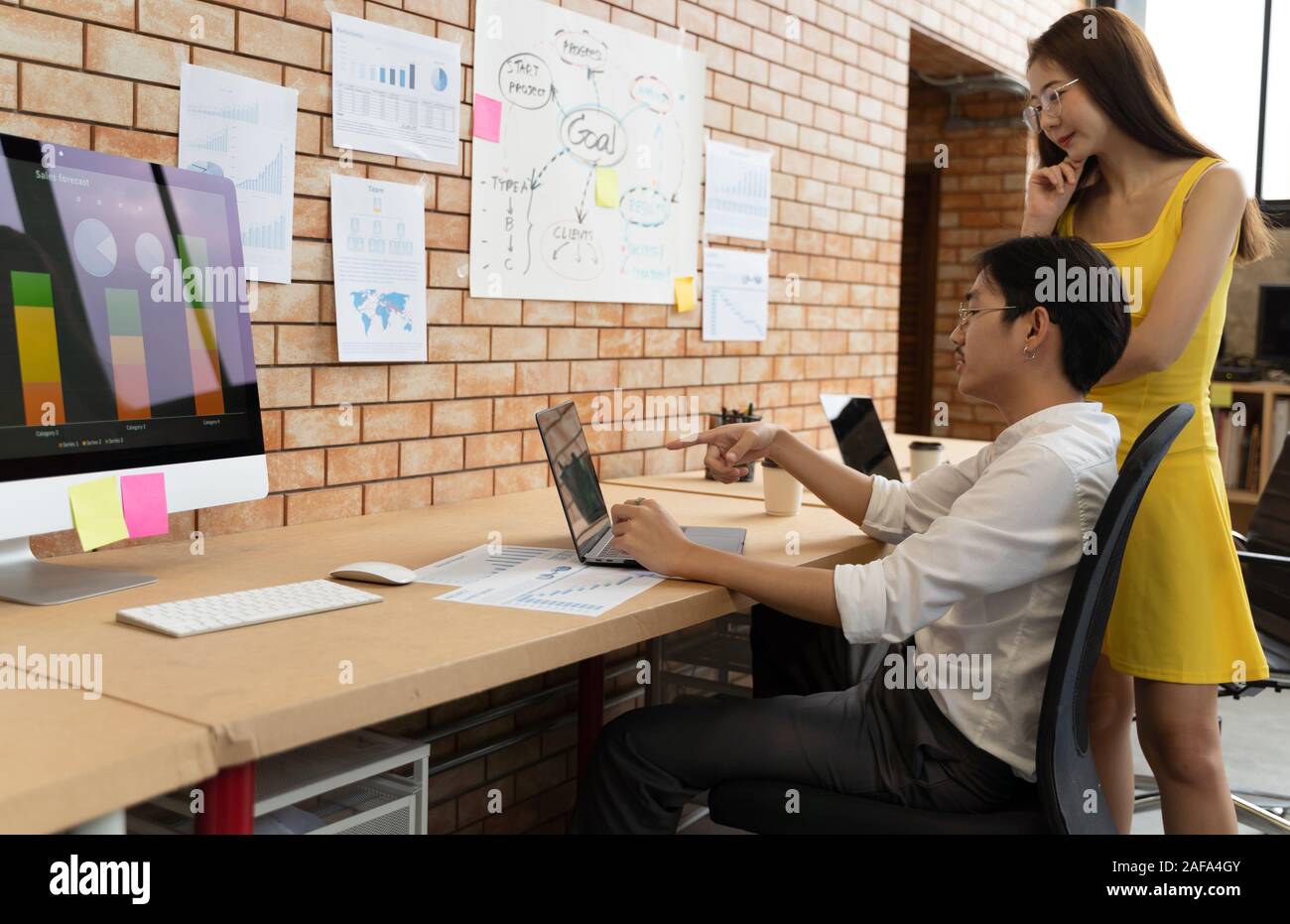 Asian business people team meeting in modern office working design planning and ideas concept Stock Photo