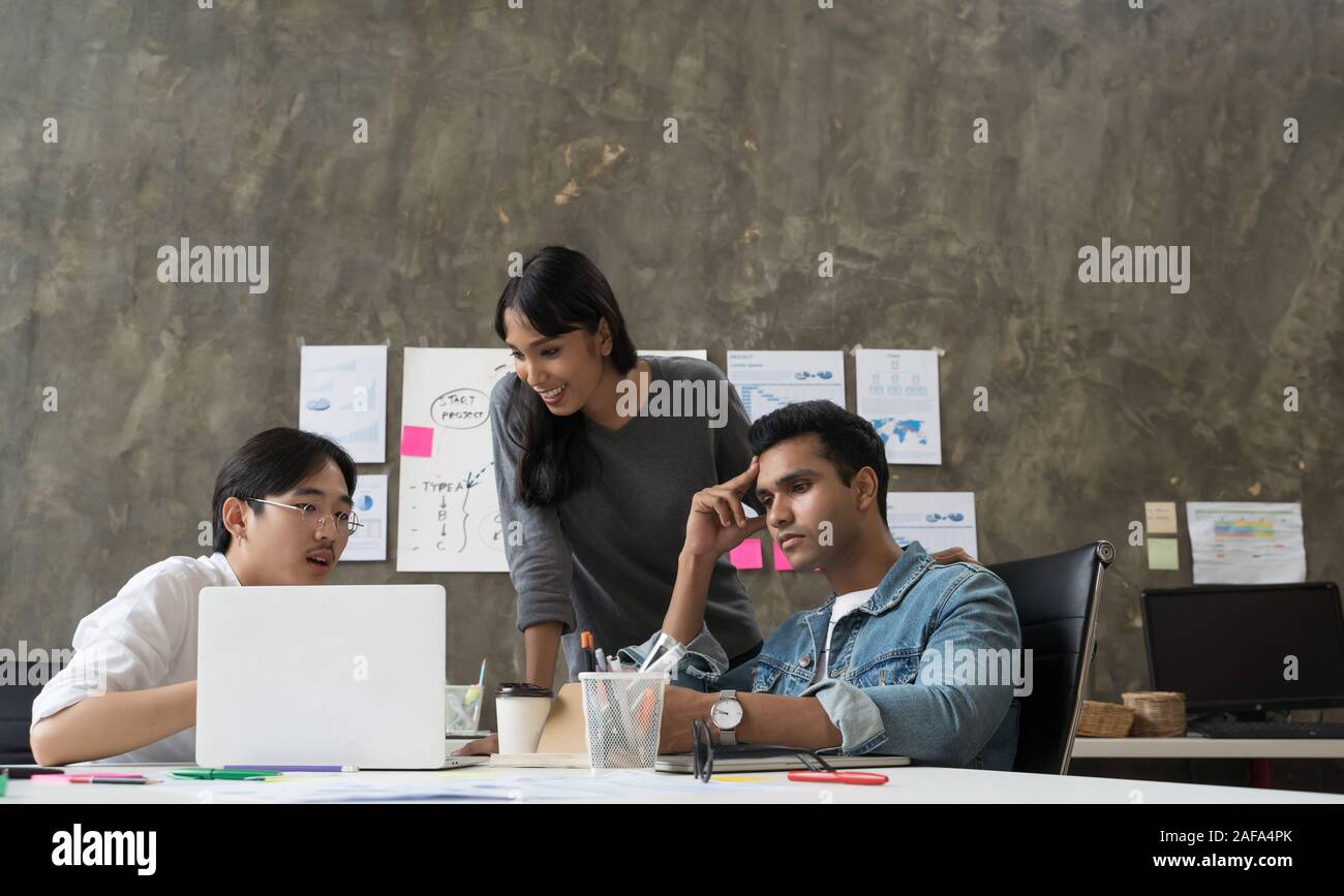 Group of Asian business people team meeting in modern office working ...