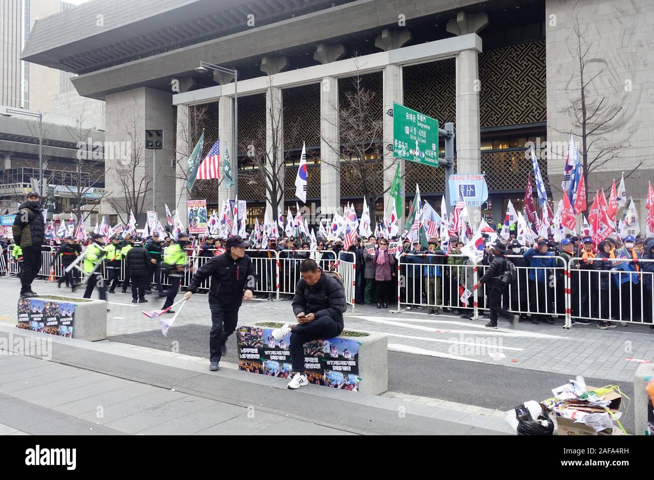 Seoul, South Korea - November 30th, 2019: Hundreds of people in march protesting against the Moon Jae-in administration. Stock Photo