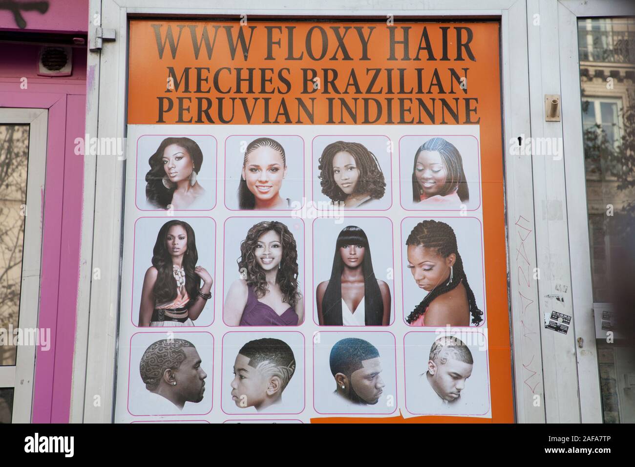 An advert for womens hairstyles in the 10th arrondissement of Paris, traditionally home to many Turkish and northwest African immigrants Stock Photo