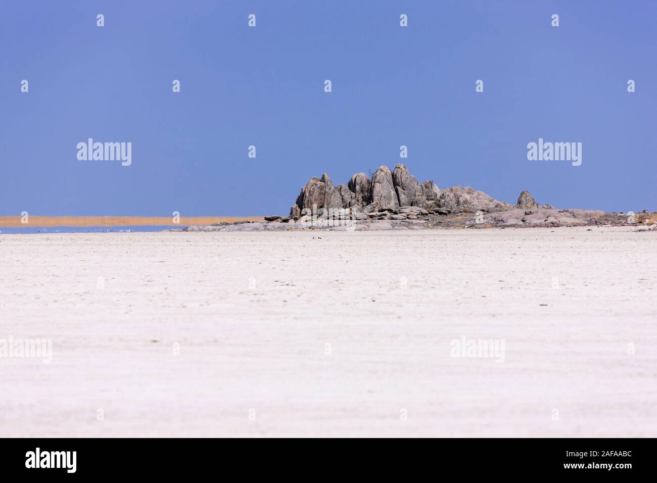 Rocky Kubu island in salt pan, Sowa pan(Sua pan), Makgadikgadi pans, Botswana, Southern Africa, Africa Stock Photo