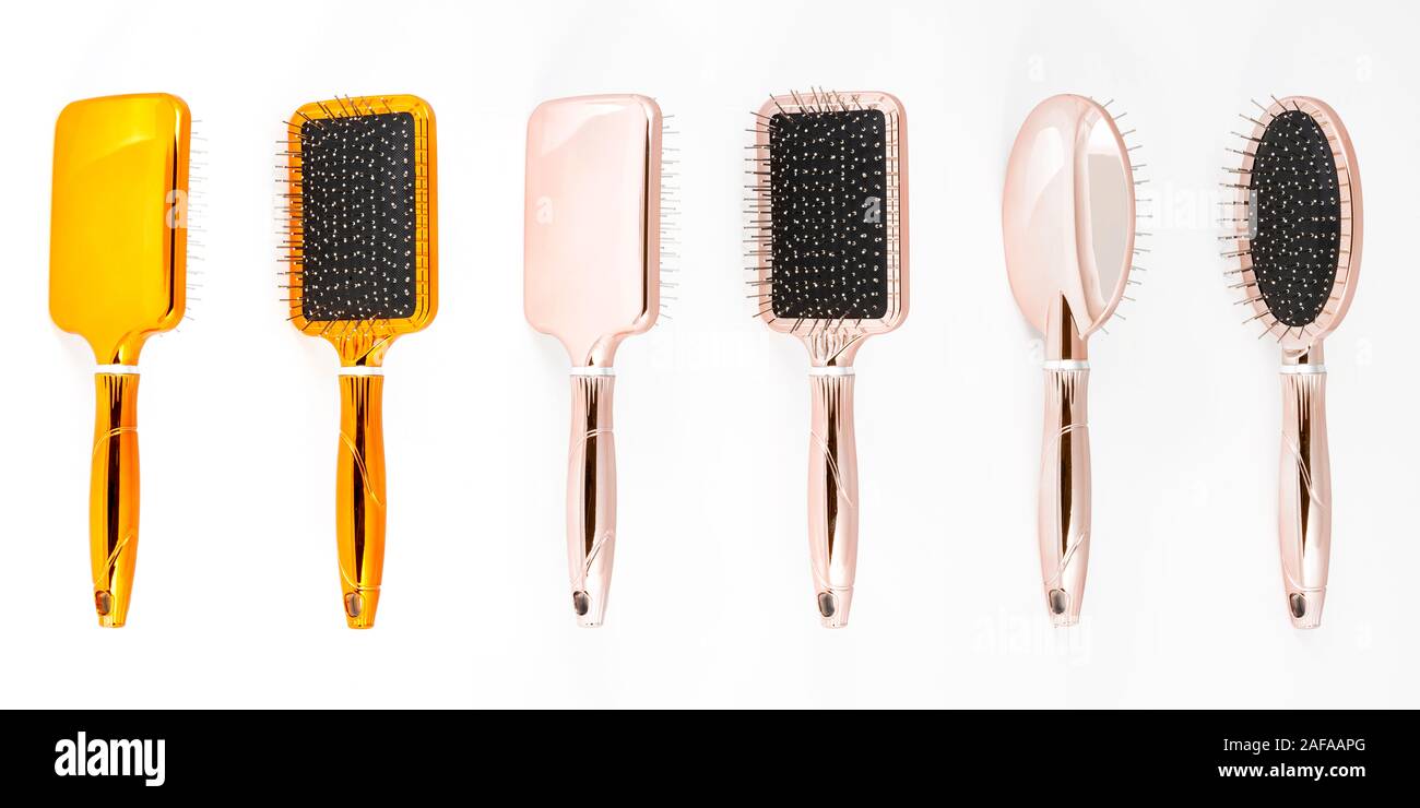 Set Of Metallic Hair Brushes Combs Different Color Isolated