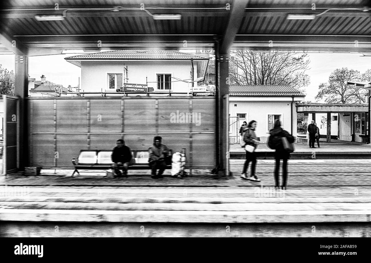 December 2019 Bulgaria Yambol to Sofia: Cold ice covered foggy morning arriving at Yambol train station ready to retrace my journey on the 827 am 1990s-style ex-DB German railways train for the 5 hour journey across to the country’s capital Sofia at the foot of domed Vitosha mountain.  Old style, and generally rather slow modern railway comforts – like air conditioning or restaurant cars – was very seldom my tickets purchased online and presented on my iPhone to the guard, unlike my first trip tickets bought with cash at the departure station on the day of travel.  I still needed to bring my o Stock Photo