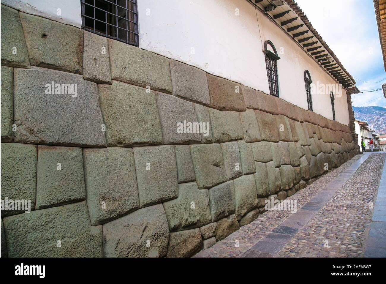 Cusco, Peru - Jan 7, 2019: Historic Colonial Buildings in Hatun Rumiyoc street , Cusco,  Peru. Stock Photo