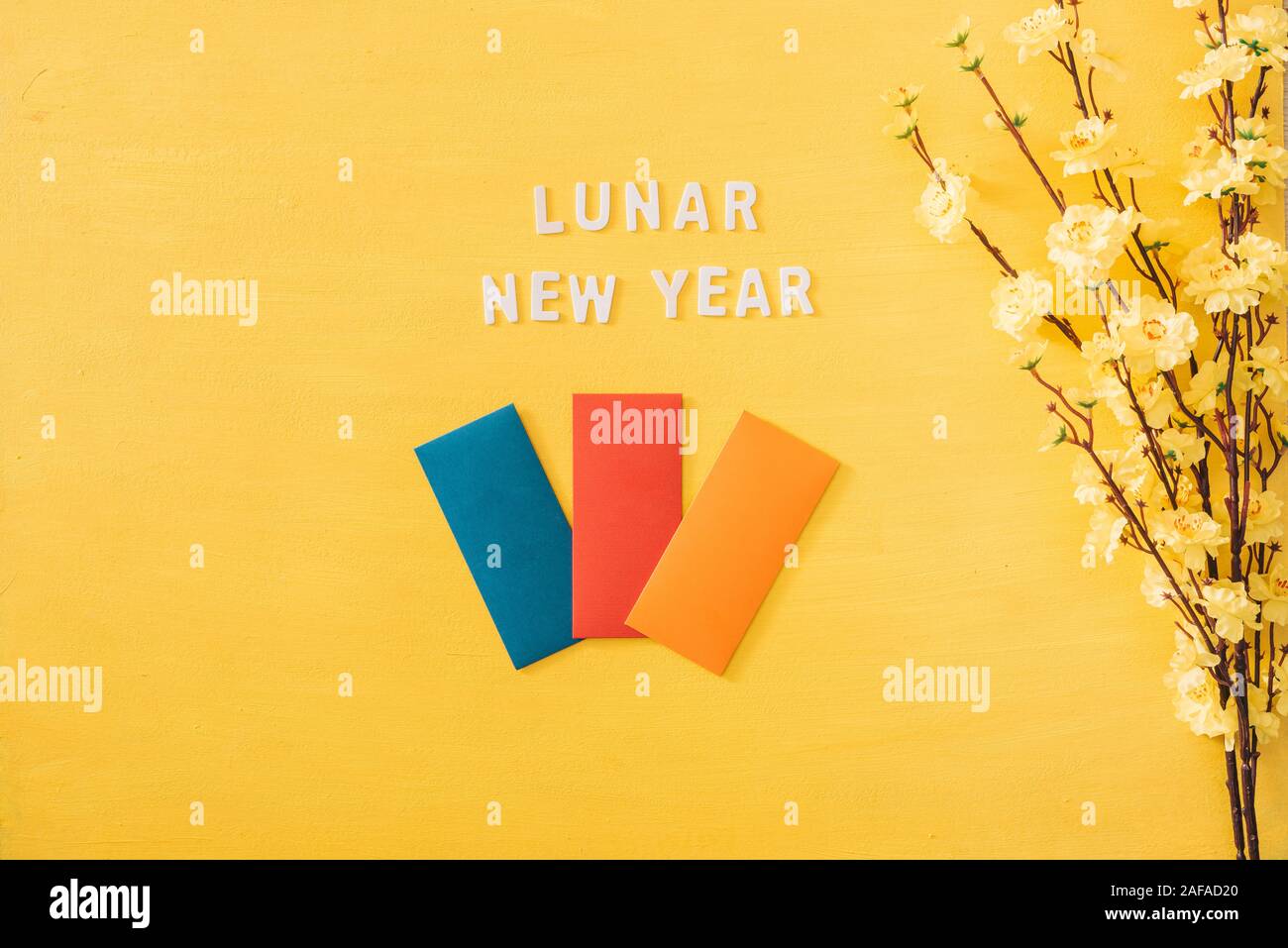 Lunar New Year decoration on a yellow gold background. Tet holiday Stock Photo