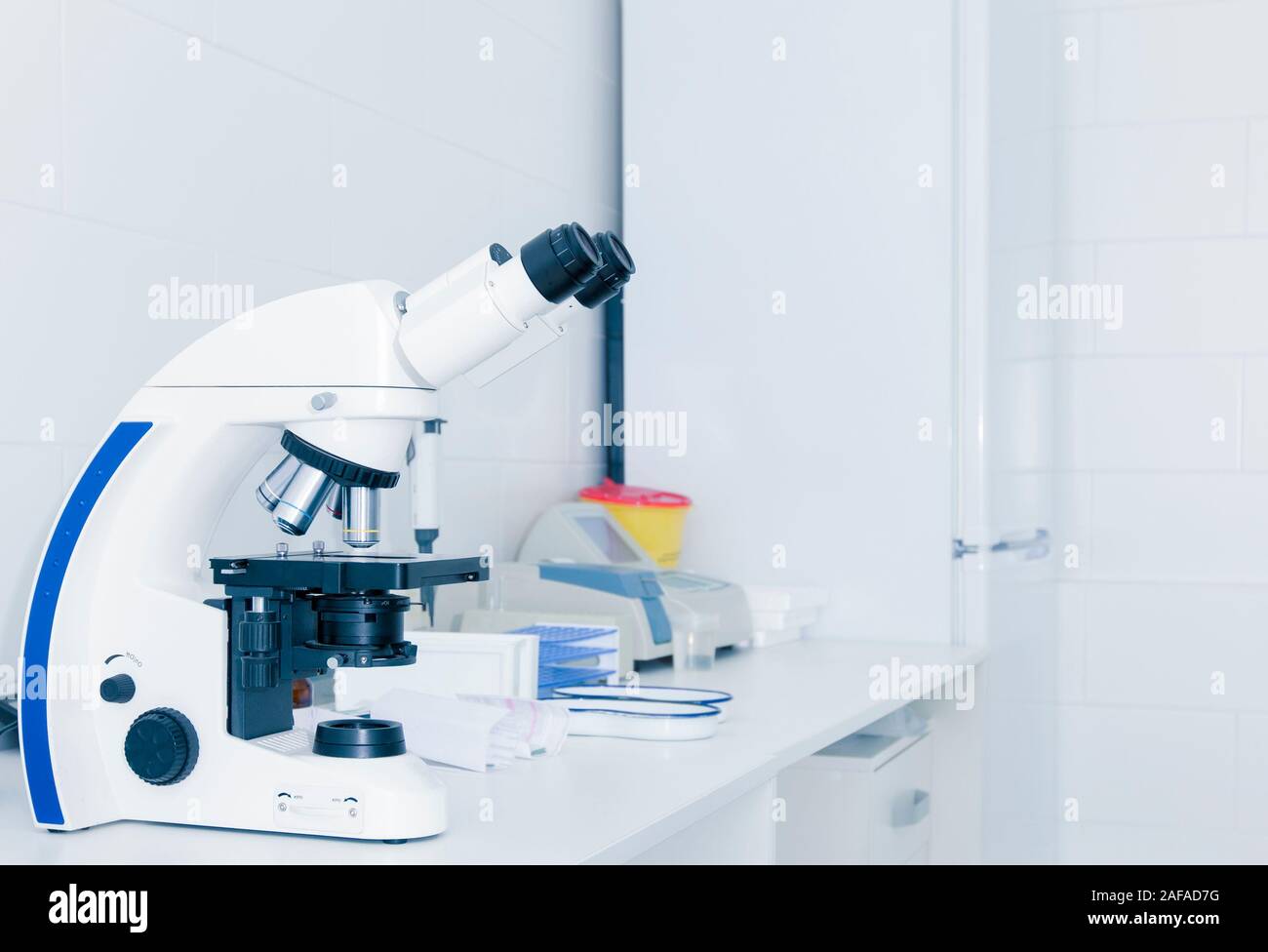 Close up of high quality microscope on table Stock Photo