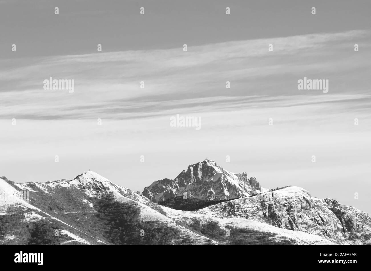 wintertime snowy mountain range - italian prealps Stock Photo