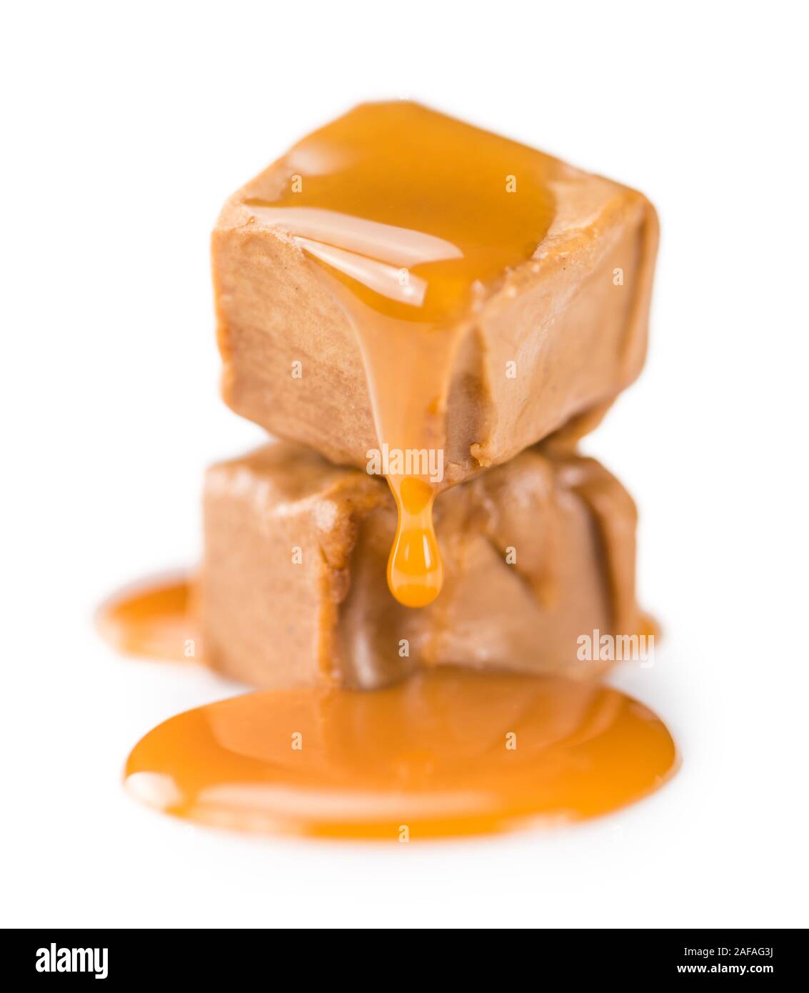 Caramel Sauce on a vintage slate slab (close-up shot; selective focus) Stock Photo