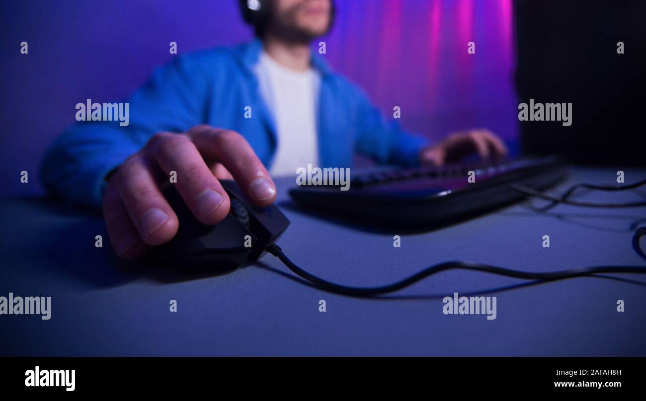 Technology ceoncept. Male hand on computer mouse Stock Photo