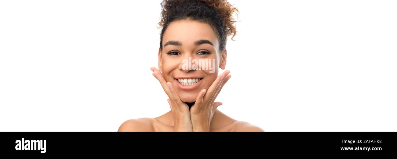 Rejuvenation concept. Young black girl touching smooth cheeks Stock ...