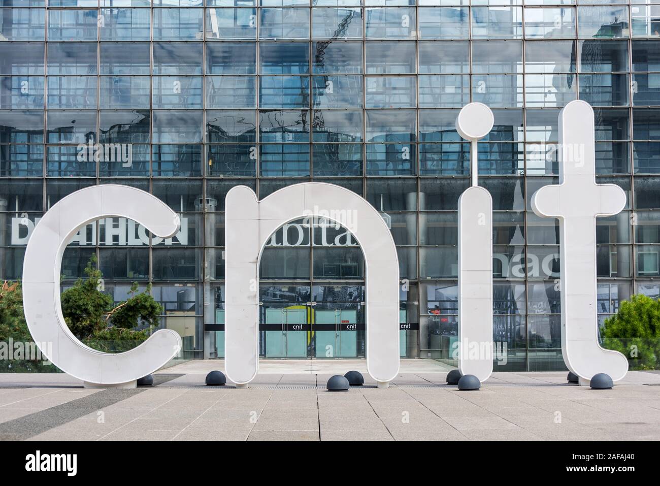 The CNIT (Centre for New Industries and Technologies), an interesting concrete and glass construction with a very unusual shape in La Defense, a major Stock Photo