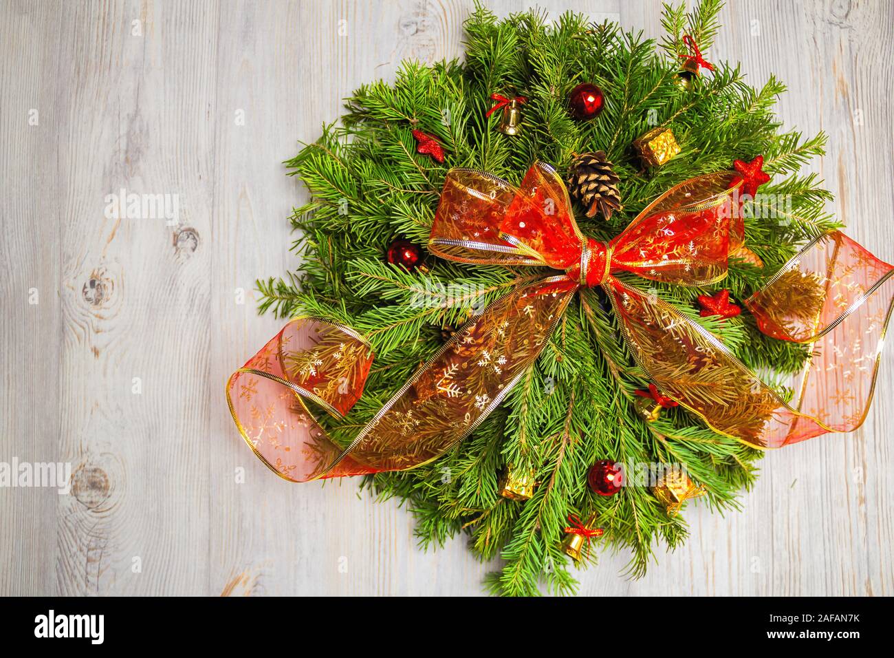 Christmas wreath of fir branches. Top view . Flat lay. Ribbon ...