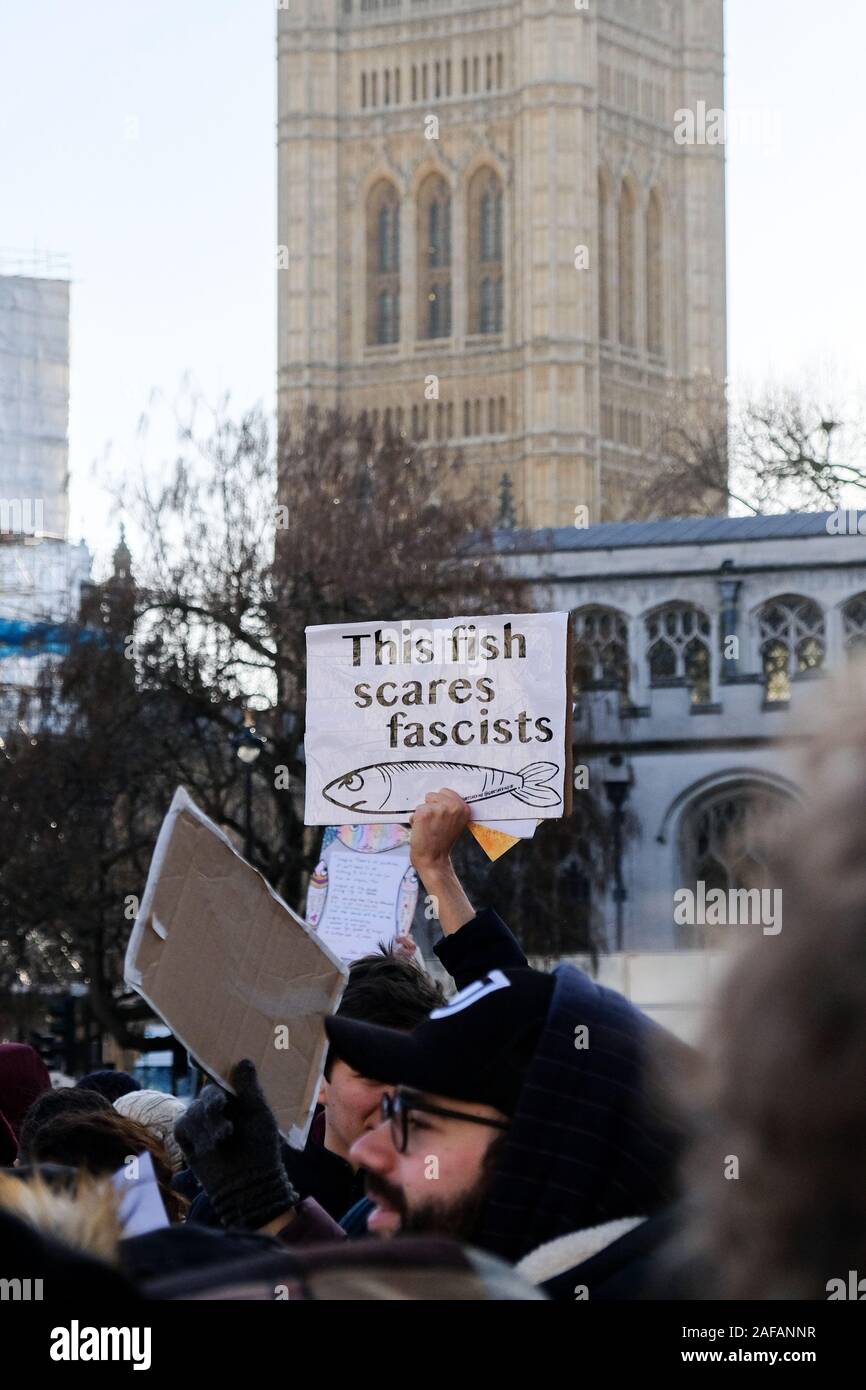 Parliament Square, London, UK. 14th December 2019. Italians in London stage a 6000 sardines antifascist protest in Parliament Square. Credit: Matthew Chattle/Alamy Live News Stock Photo