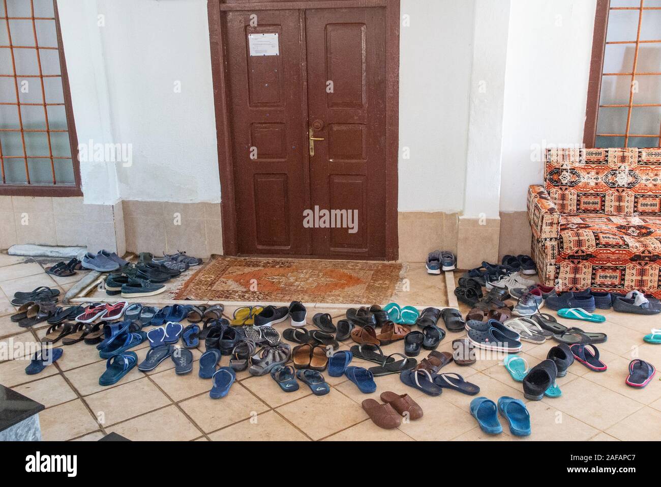 Shoes outside a mosque hires stock photography and images Alamy