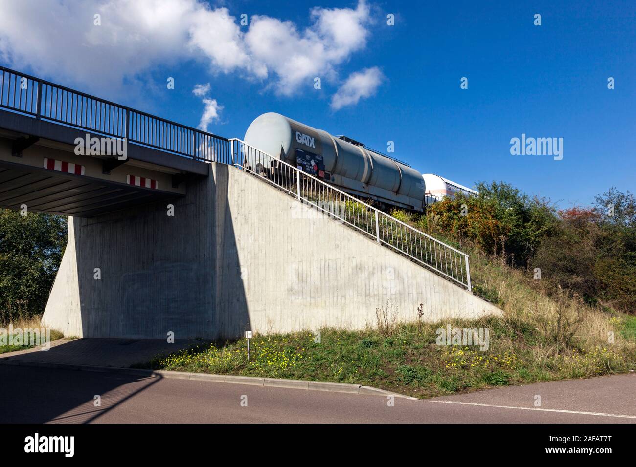 Tank wagons on a railway embankment Stock Photo
