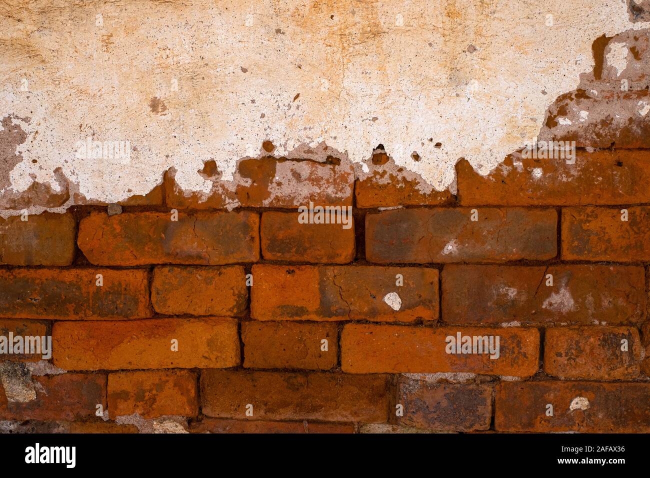 Closeup old grungy brick wall concrete texture background Stock Photo