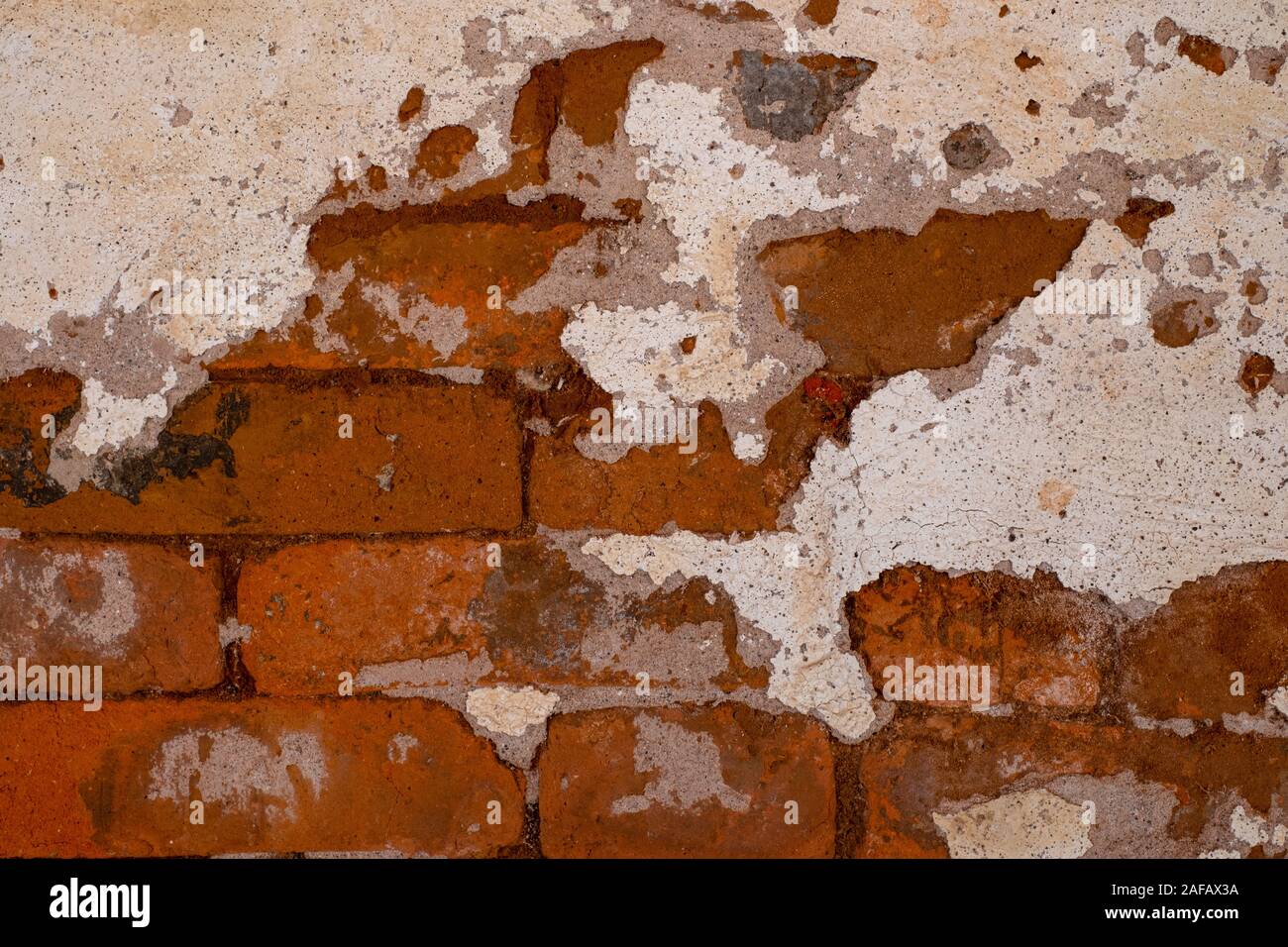 Closeup old grungy brick wall concrete texture background Stock Photo