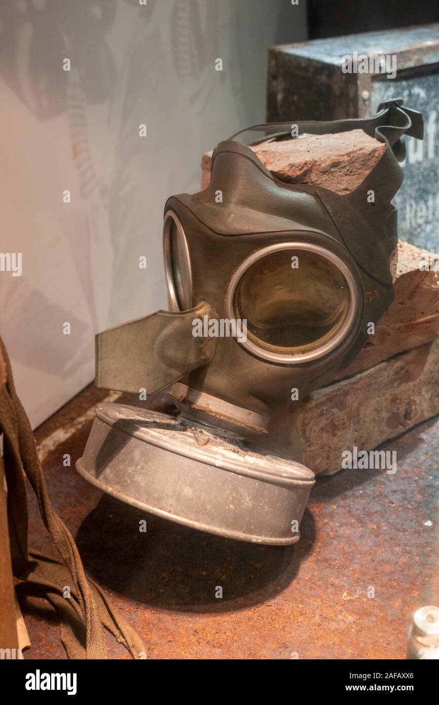 WWII gas mask inside the small buker museum inside Fuggerei, a walled enclave within the city of Augsburg, Bavaria, Germany. Stock Photo