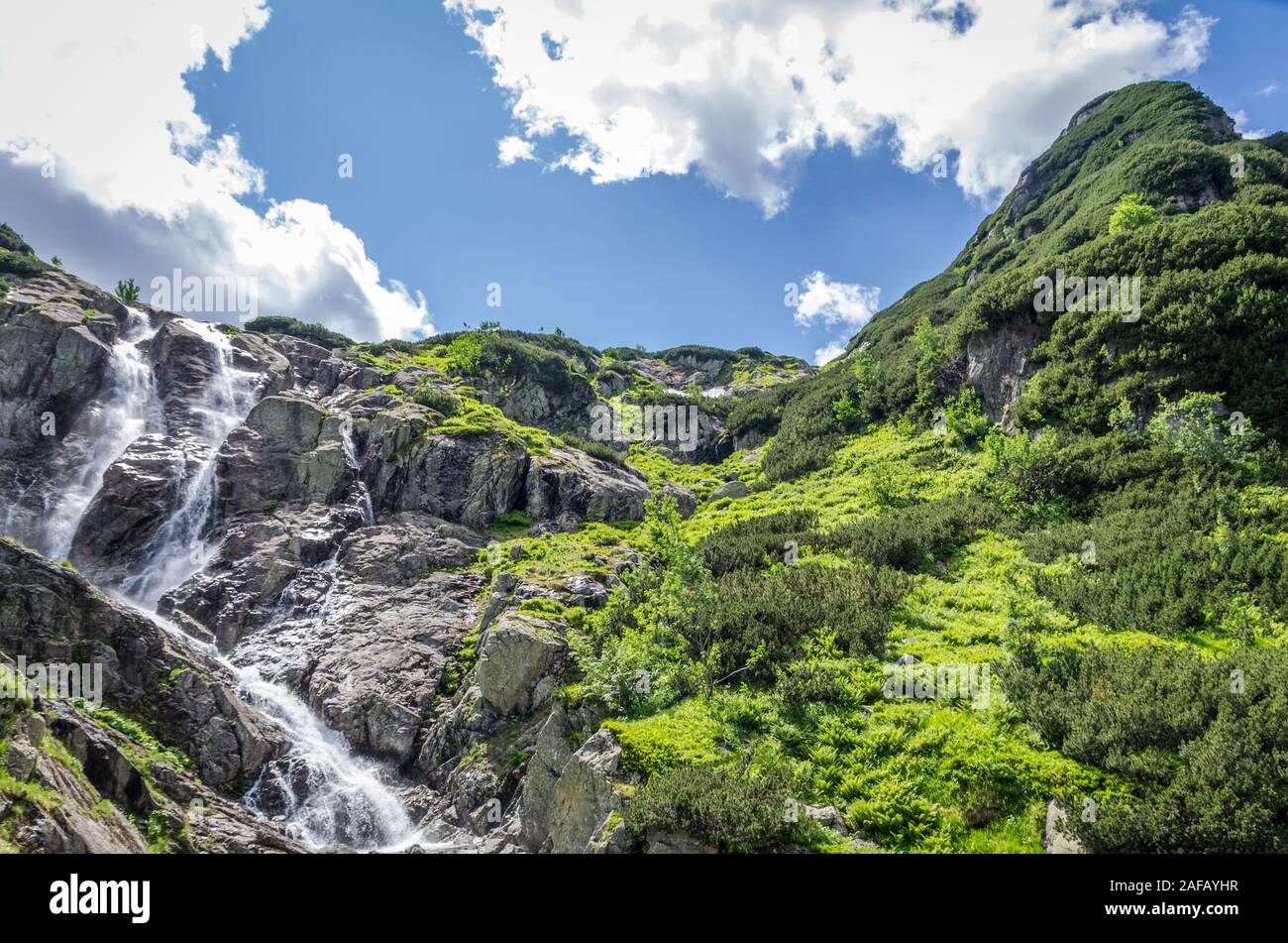 Mountain waterfall Siklawa in Polish Tatra Mountains. Tatra National Park Stock Photo