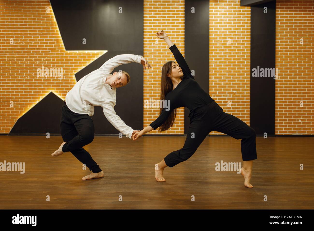Contemporary dance partners, couple in studio Stock Photo - Alamy
