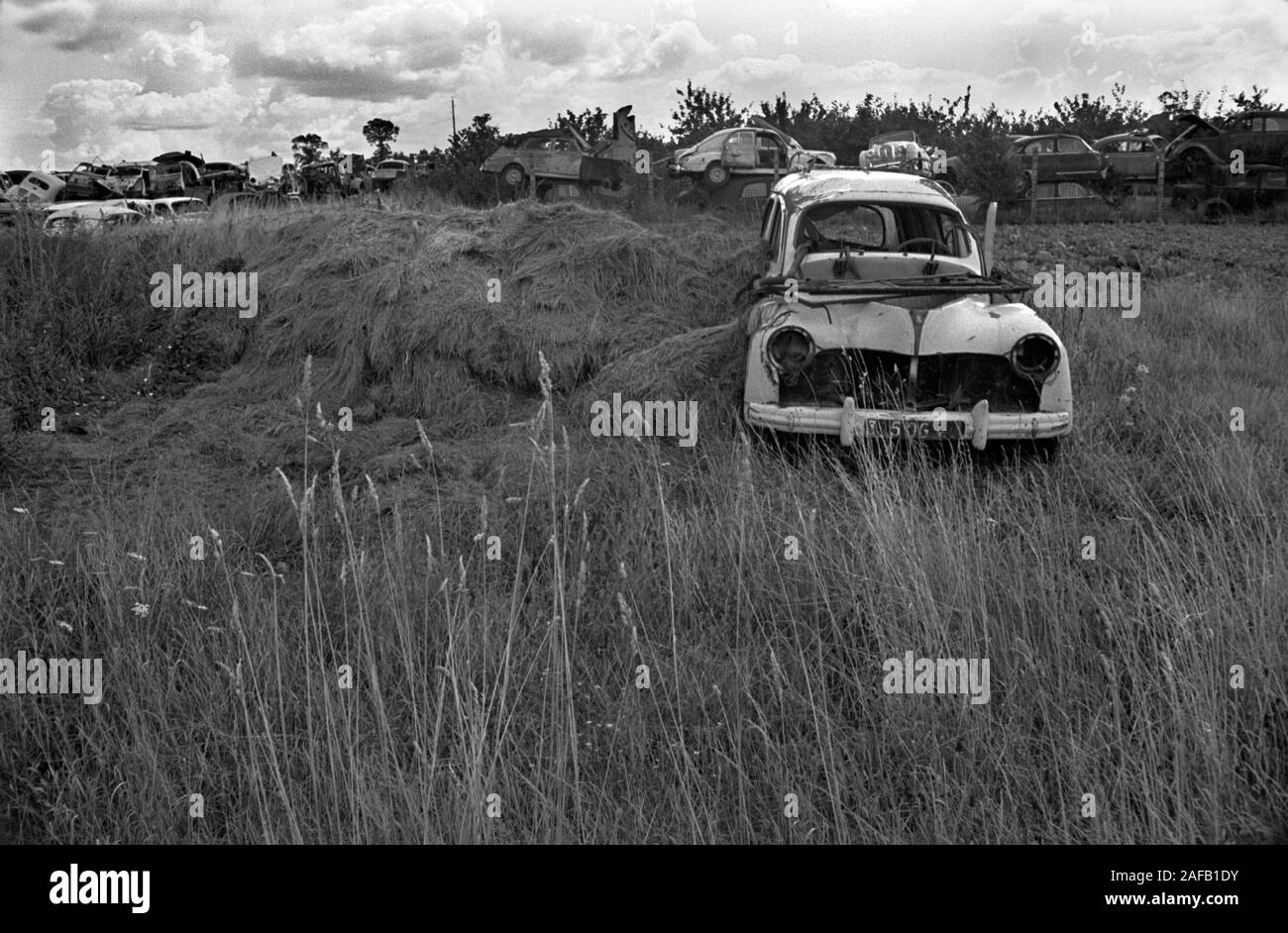 French landscape cars vehicles abandoned after World War II, and dumped in fields in Normandy.  France. 1967 1960s. HOMER SYKES Stock Photo