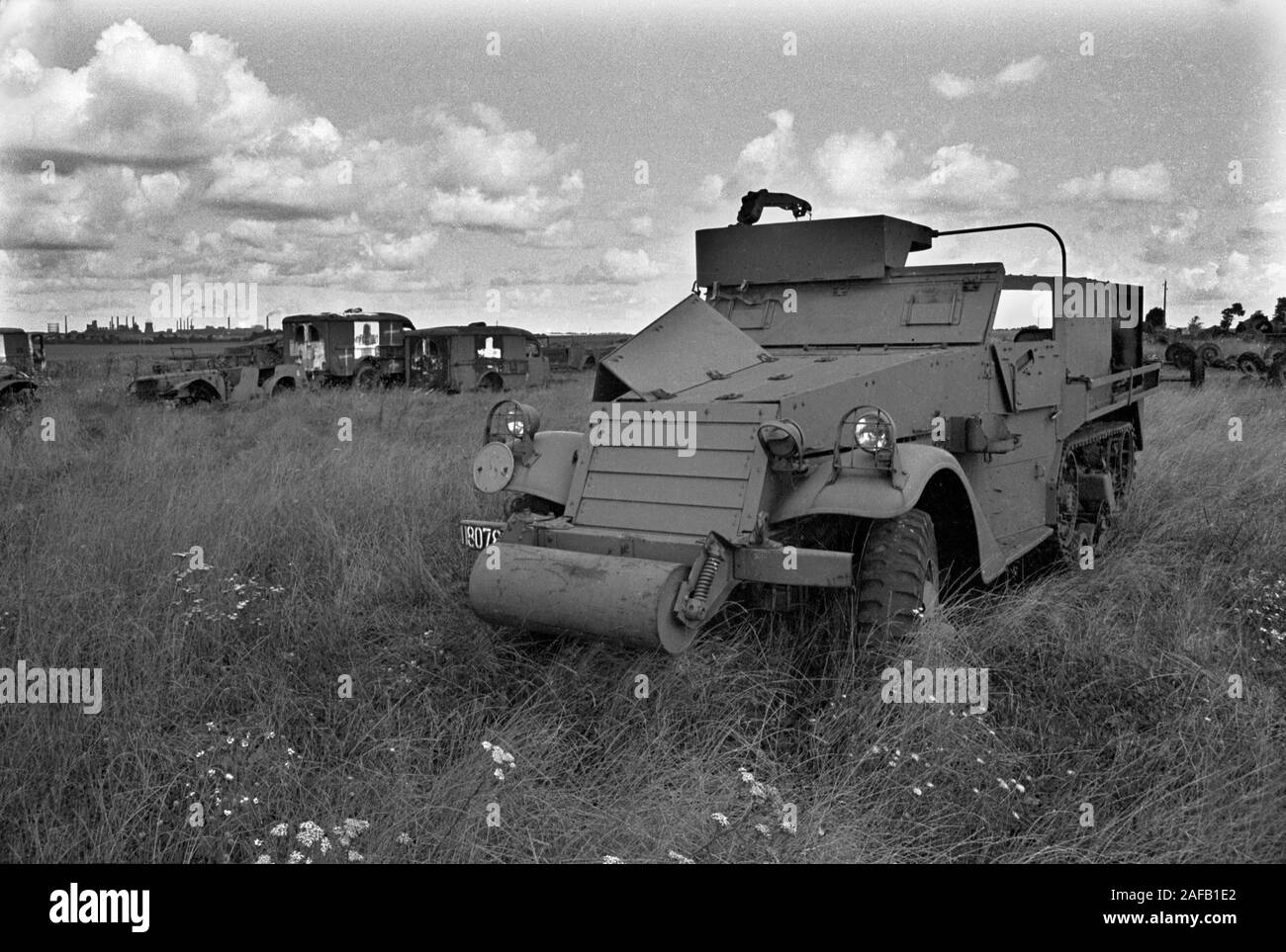 Second World War WW2 army military vehicles and  cars dumped in French landscape.1960s Normandy France. 1967 HOMER SYKES Stock Photo