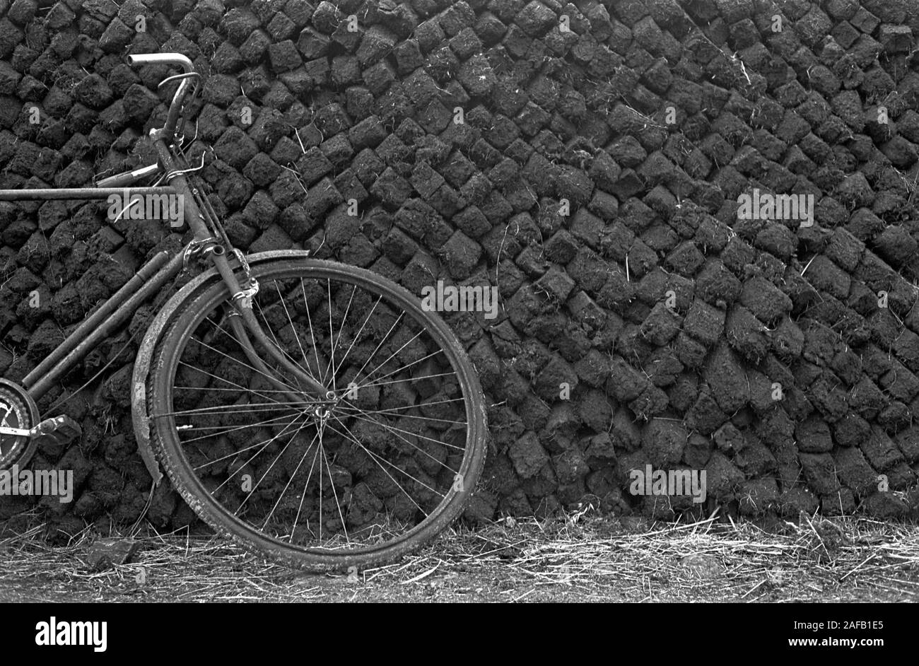 Peat stacked up on smallholding farm West Coast County Kerry, Eire 1960s 1969. HOMER SYKES Stock Photo