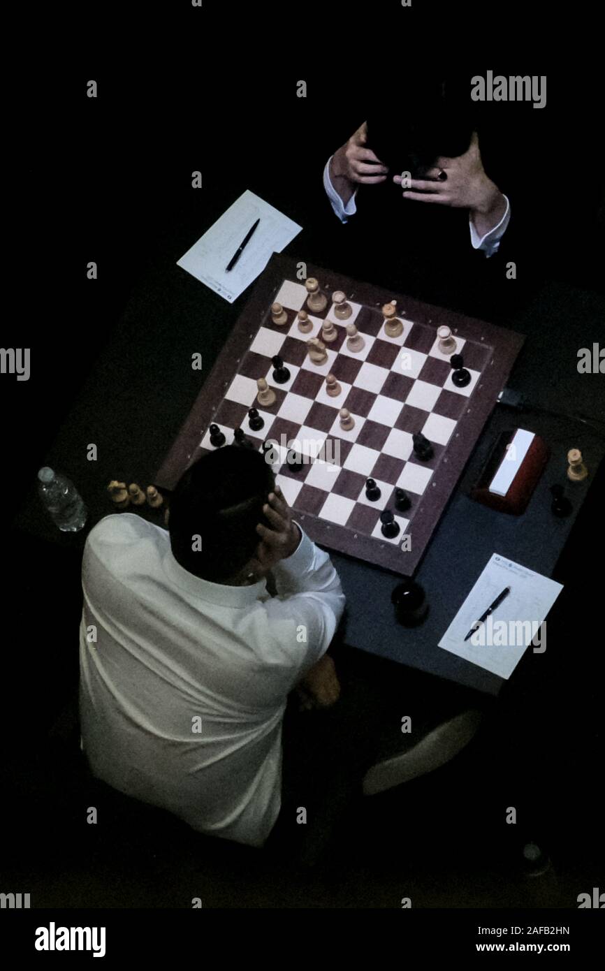 Jerusalem, Israel. 14th December, 2019. WESLEY SO (L), 27, of the USA,  competes with IAN NEPOMNIACHTCHI (R), 29, of Russia, in Round 2, Game 1, of  the final leg of the World