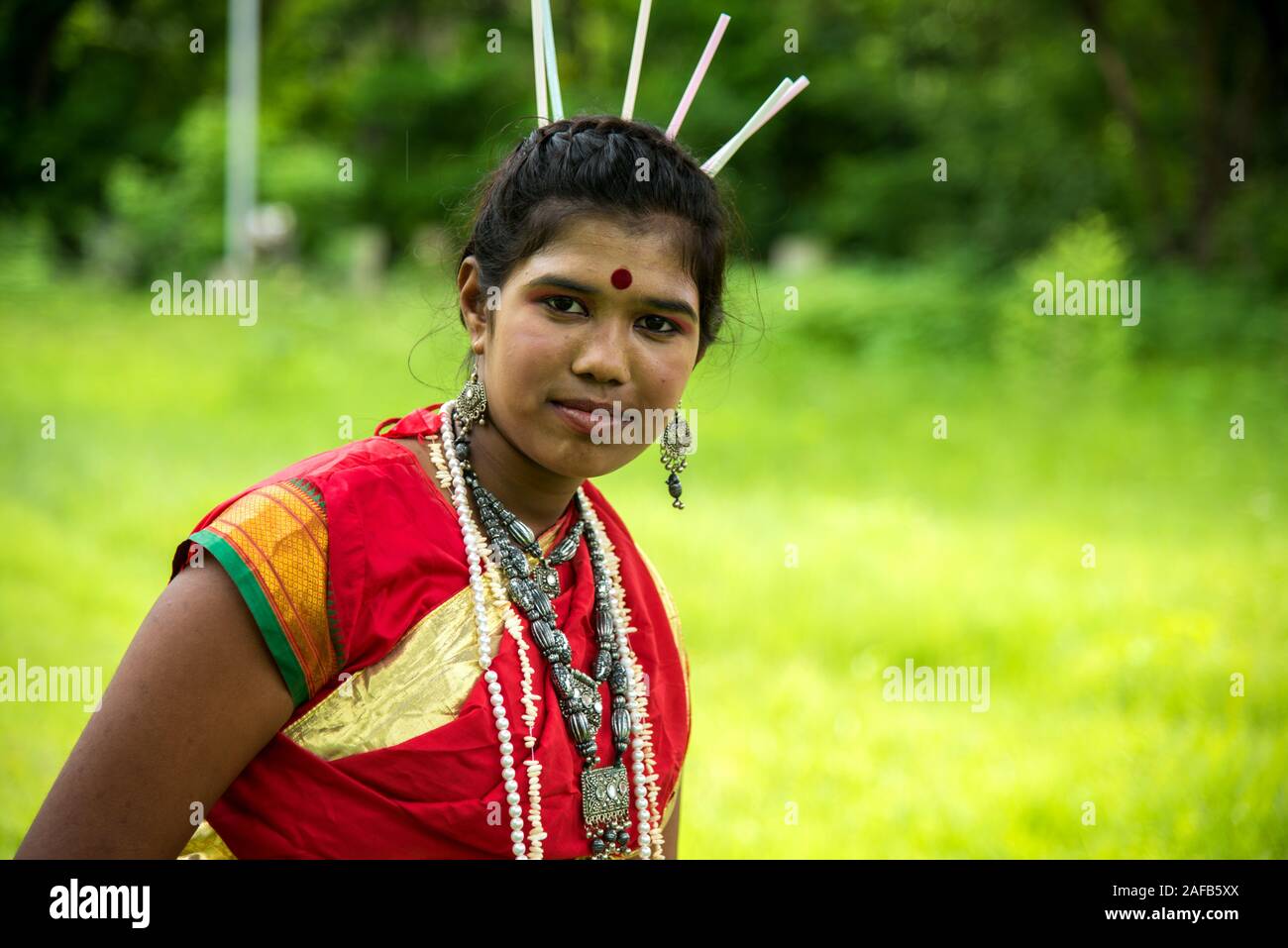 AMRAVATI, MAHARASHTRA, INDIA - AUGUST 9 : Group of Gondi tribes celebrating world tribal day by performing folk Dance in Amravati, Maharashtra, India Stock Photo