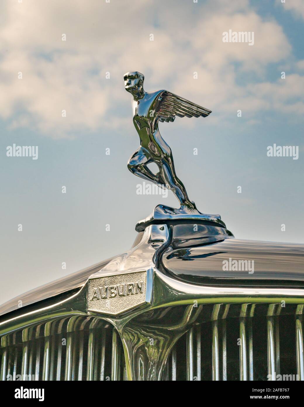 PLYMOUTH, MI/USA - JULY 28, 2019: Closeup of a 1932 Auburn 8-100A 'Running Man' hood ornament at the Concours d'Elegance of America car show. Stock Photo