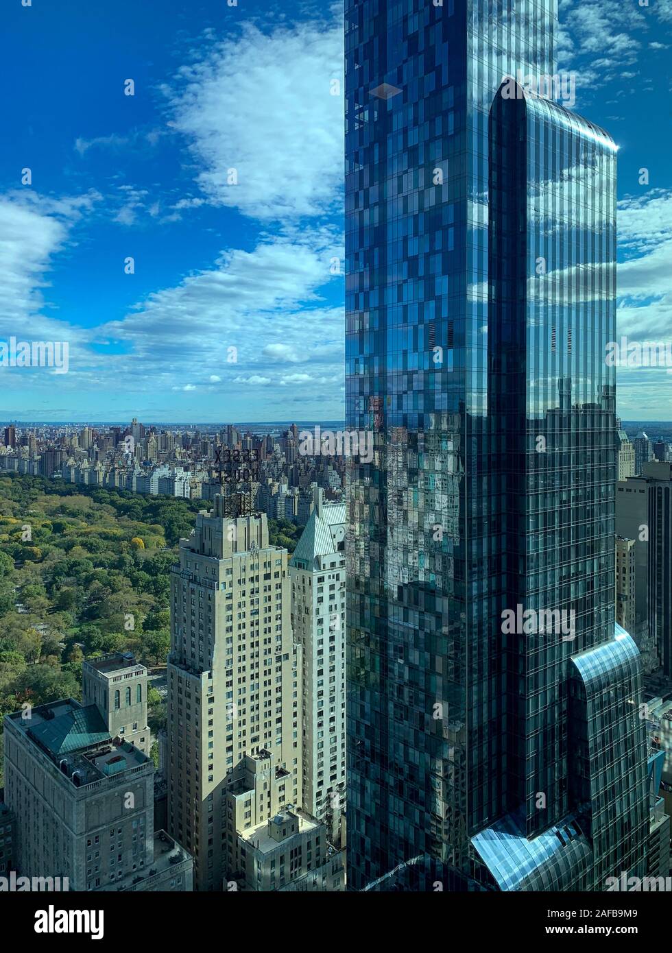 Aerial view along Central Park in New York City from Midtown Manhattan ...