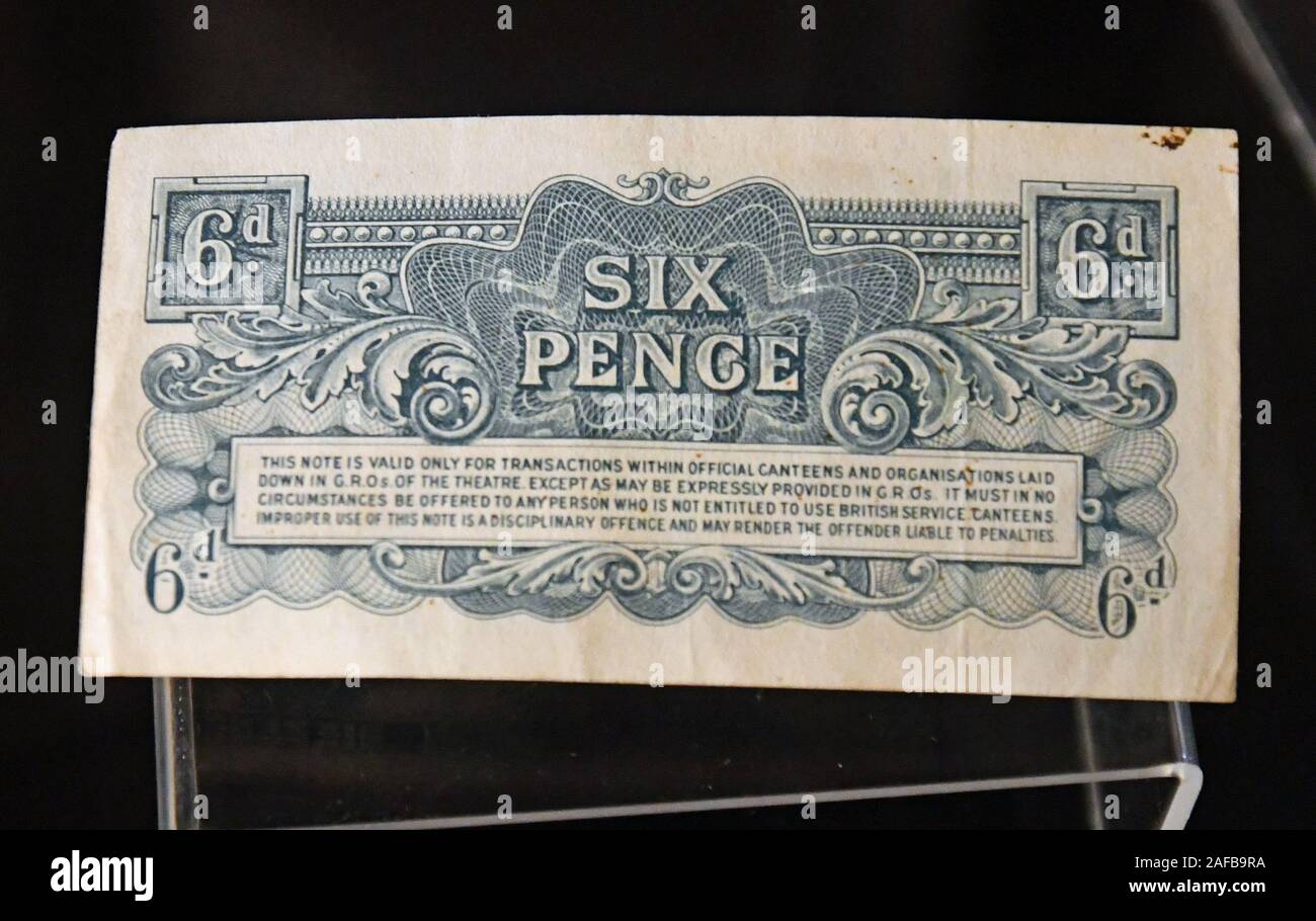 A 6d six pence bank note, thought to be from the 1940s, WWII. Reads 'valid only for transactions within official canteens, and organisations laid down in G.R.O.s'. For persons 'entitled to use British Service canteens'. Stock Photo