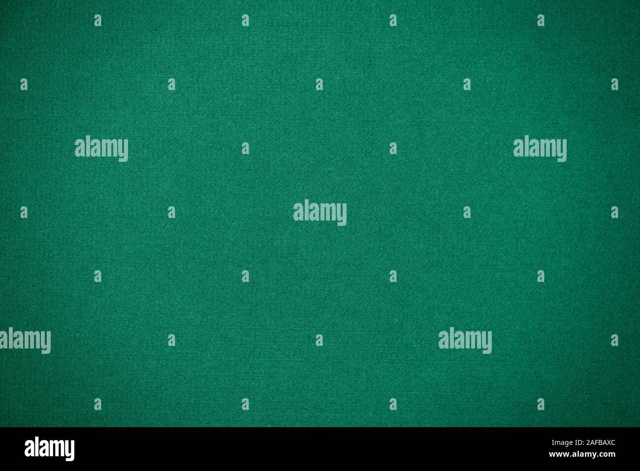 Poker green table texture. Top view background with copy space Stock