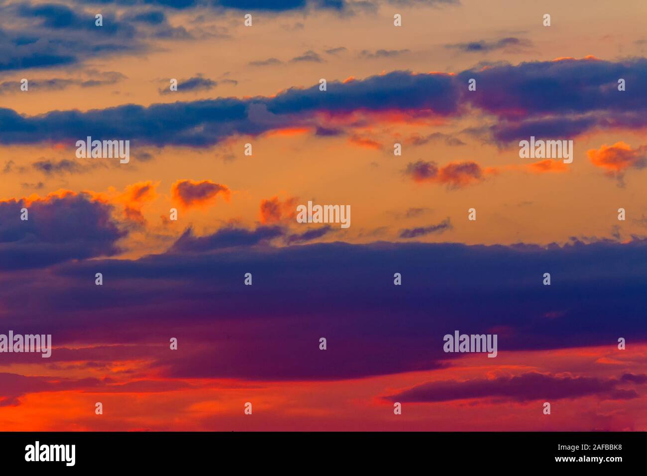 orange sunset sky with clouds. beautiful nature background Stock Photo ...