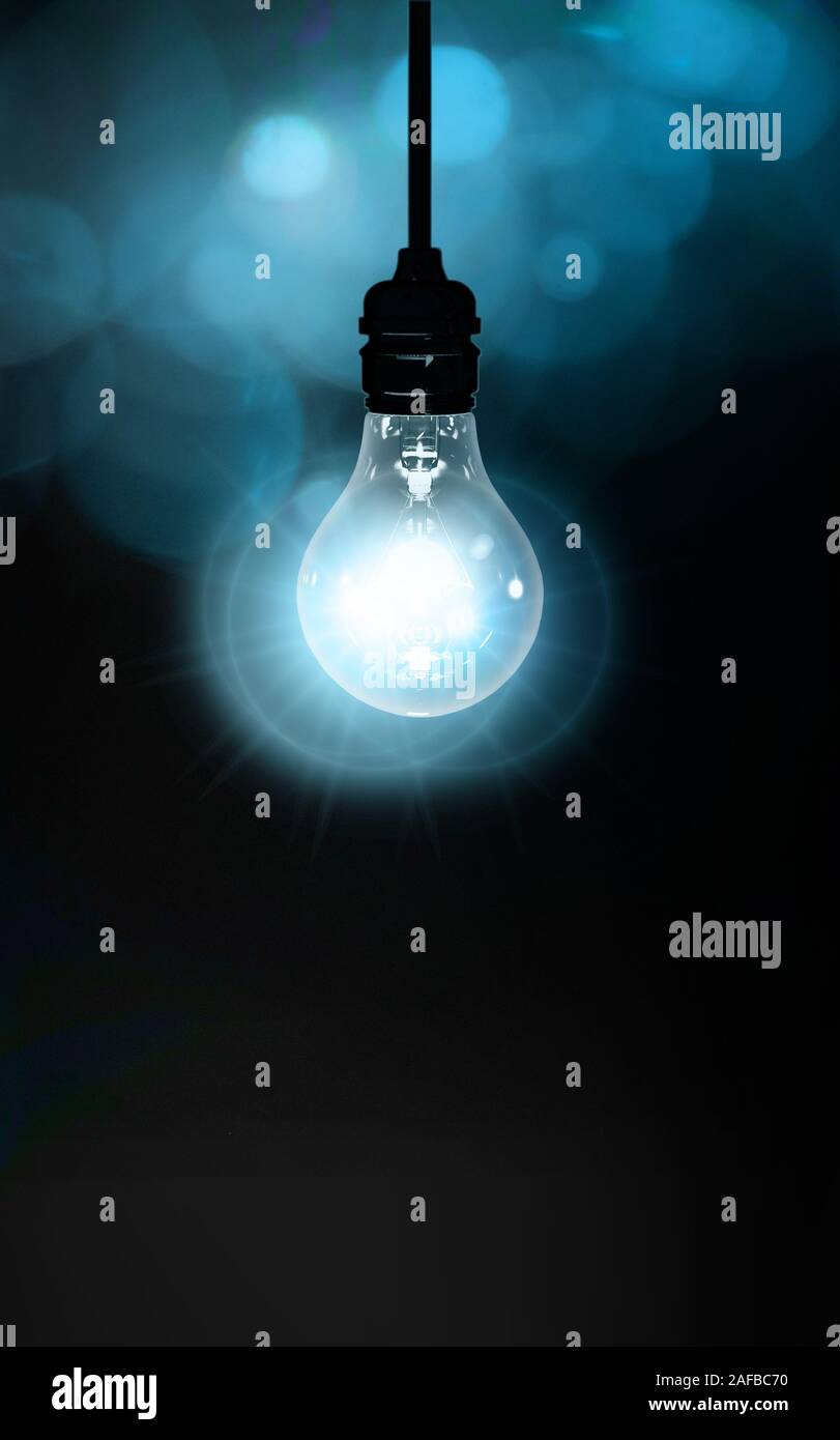 Realistic light bulb on the black background with reflection. Lamp light in  the dark. Electric bulb. Glowing light in the dark Stock Photo - Alamy