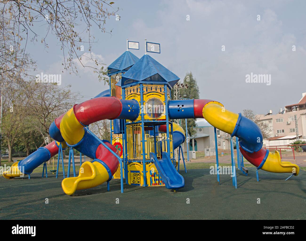 A colorful public playground in a garden Stock Photo - Alamy