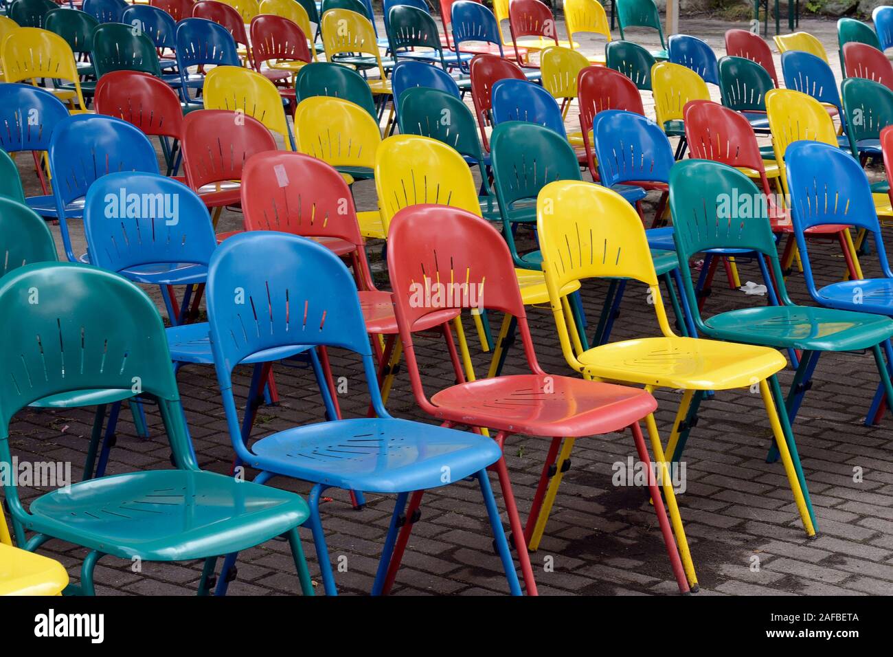 viele bunte Klappstuehle vor einer Buehne im ehemaligen Freizeitpark 'Spreepark Berlin ', ehemaliger Kulturpark der DDR, Deutschland, Europa Stock Photo