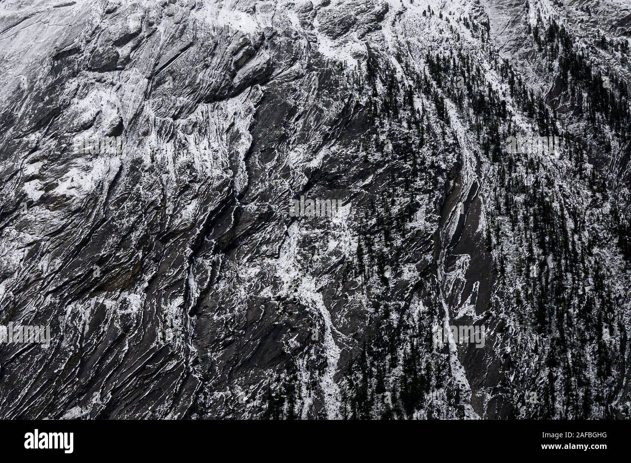 Close Up Weathered Rocky Mountain With Snow Pattern On Texture Stock Photo Alamy
