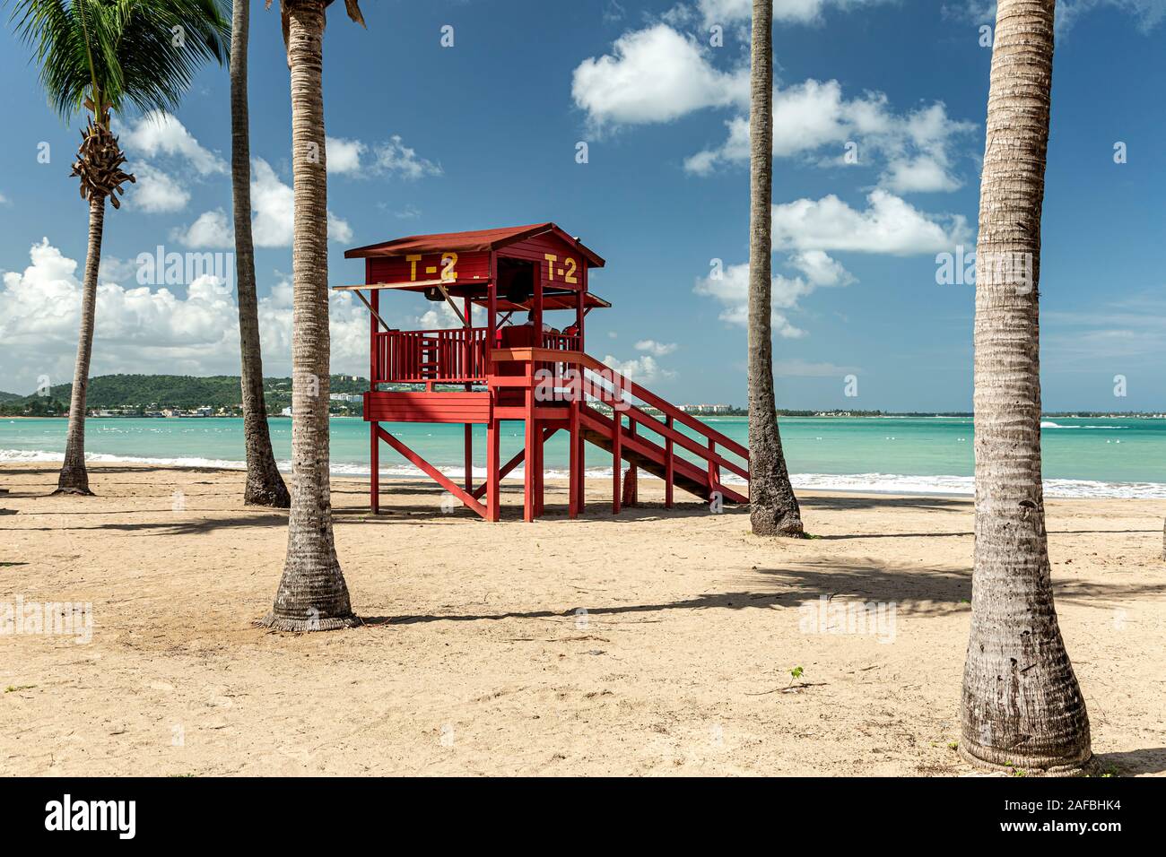 Lifeguard house and palm trees, Luquillo Beach, Luquillo, Puerto Rico Stock Photo