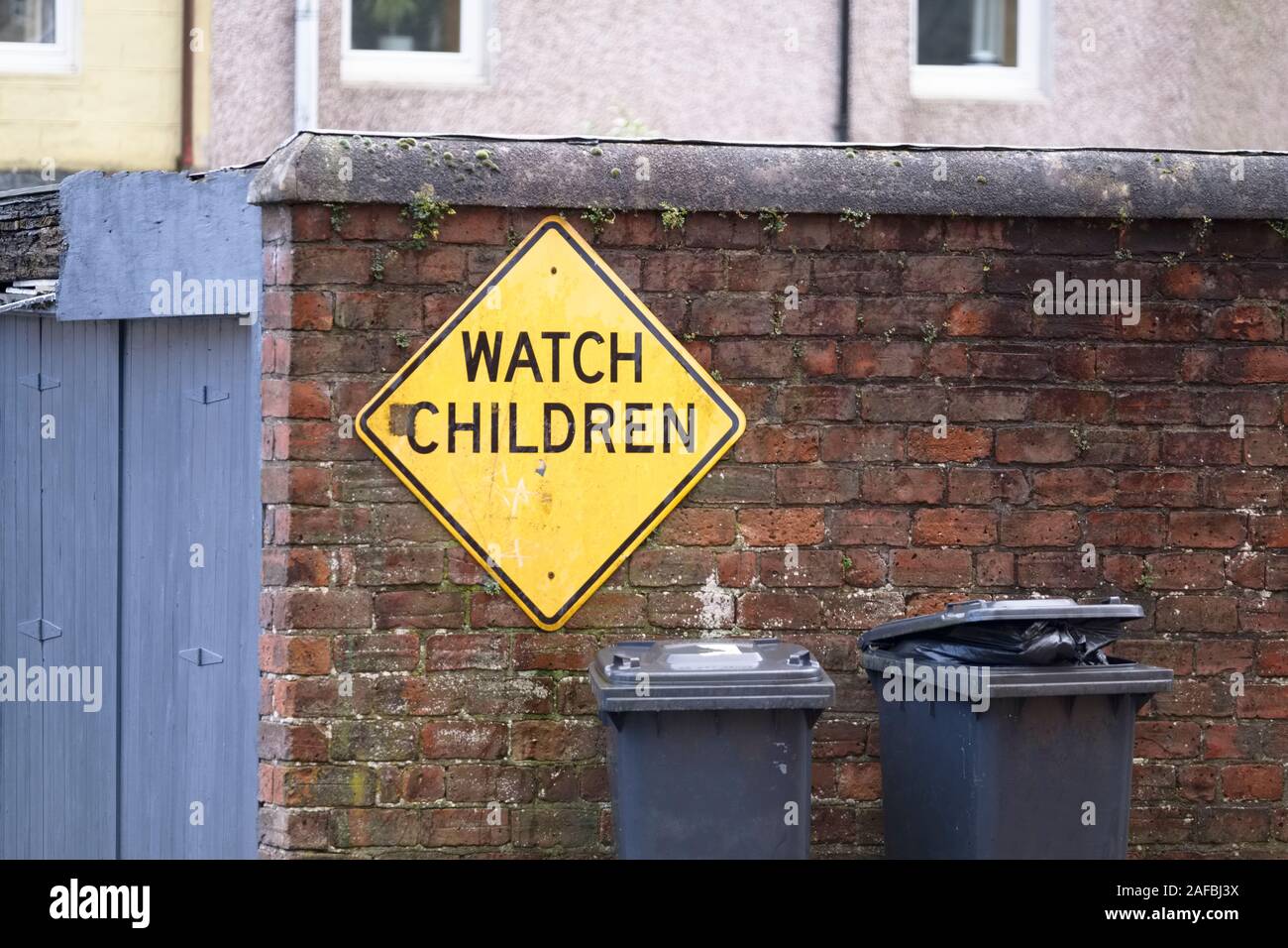 Watch children safety sign at council housing estate London Stock Photo