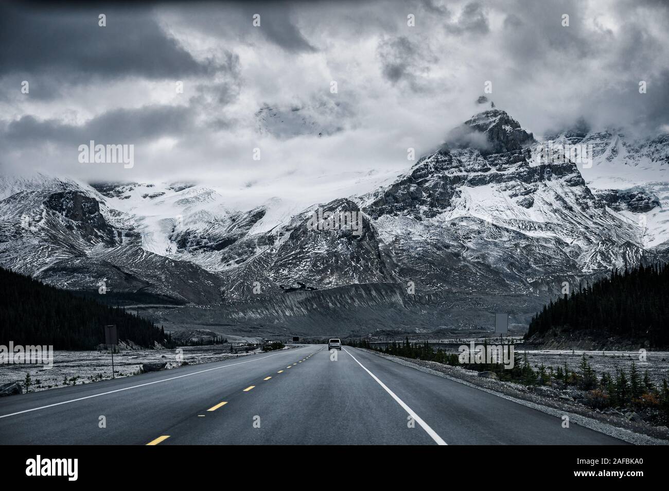 Road Trip With Snowy Rocky Mountains In Gloomy At Icefields Parkway Canada Stock Photo Alamy Road Trip With Snowy Rocky Mountains In Gloomy At Icefields Parkway Canada Stock Photo Alamy