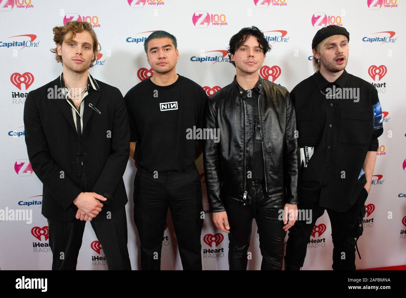 Musicians Luke Hemmings, Calum Hood, Ashton Irwin and Michael Clifford of 5 Seconds to Summer arrive at iHeartRadio's Z100 Jingle Ball 2019 at Madison Square Garden on December 13, 2019 in New York City, New York. Stock Photo