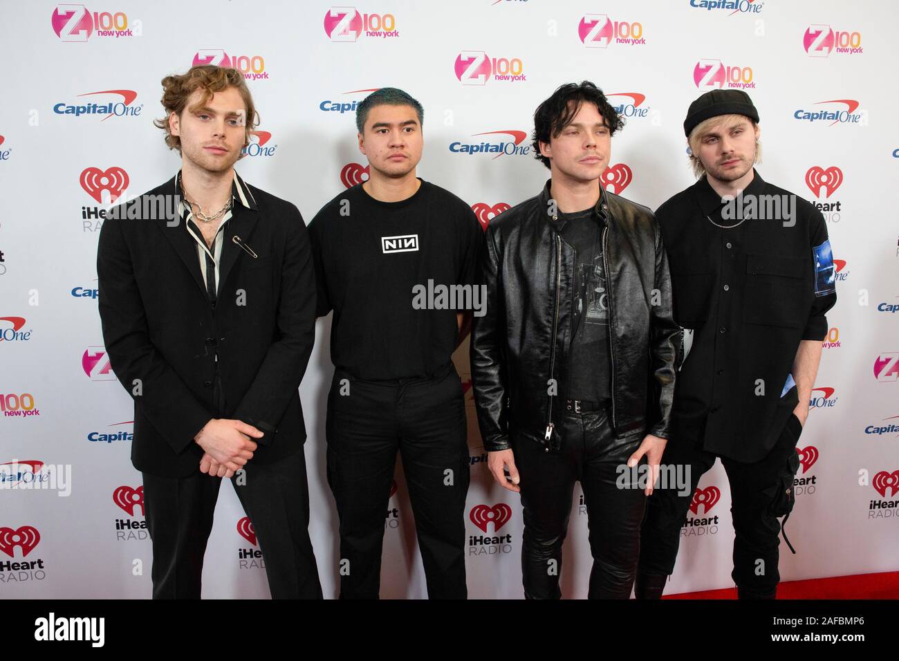 Musicians Luke Hemmings, Calum Hood, Ashton Irwin and Michael Clifford of 5 Seconds to Summer arrive at iHeartRadio's Z100 Jingle Ball 2019 at Madison Square Garden on December 13, 2019 in New York City, New York. Stock Photo