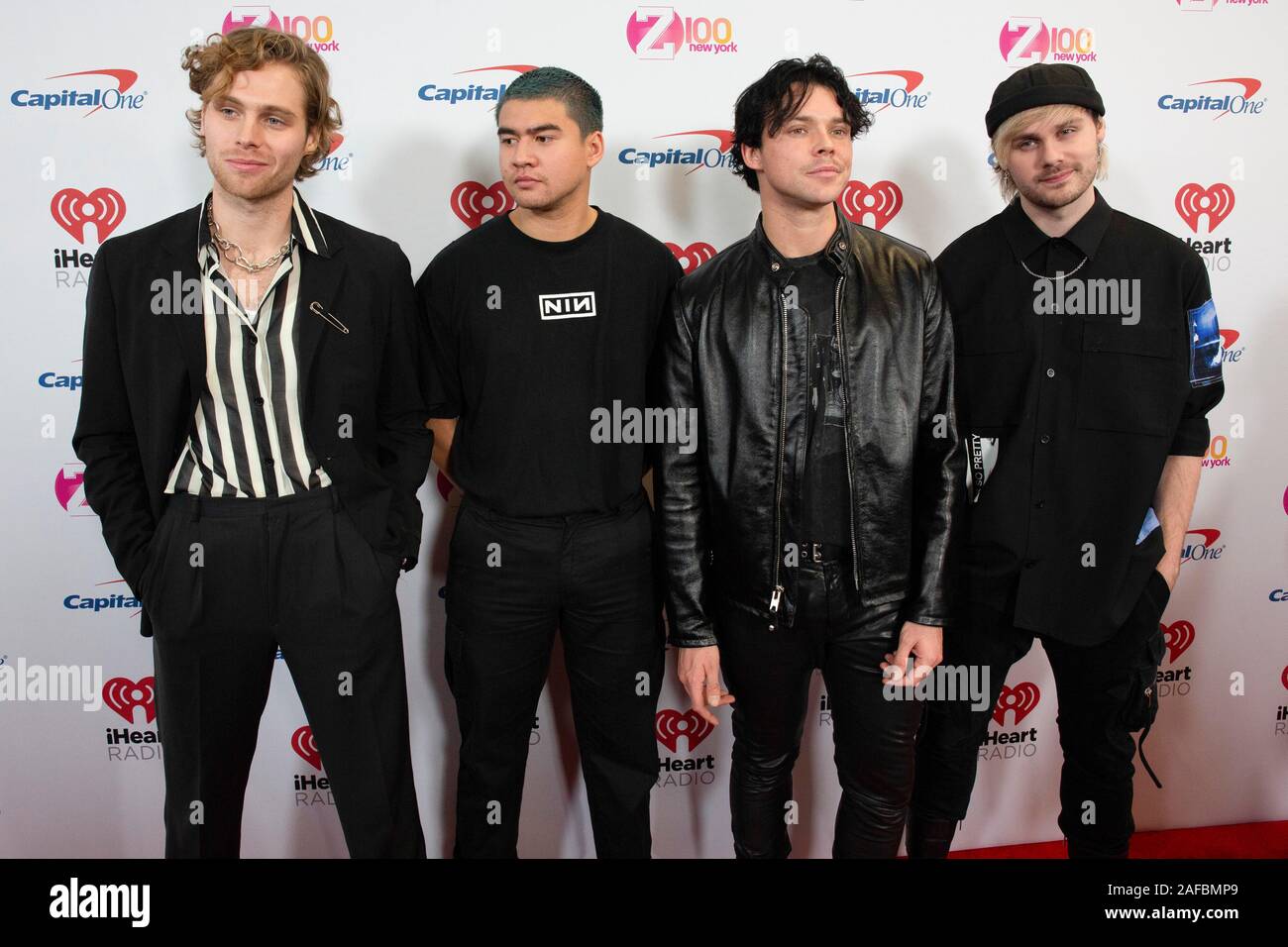 Musicians Luke Hemmings, Calum Hood, Ashton Irwin and Michael Clifford of 5 Seconds to Summer arrive at iHeartRadio's Z100 Jingle Ball 2019 at Madison Square Garden on December 13, 2019 in New York City, New York. Stock Photo