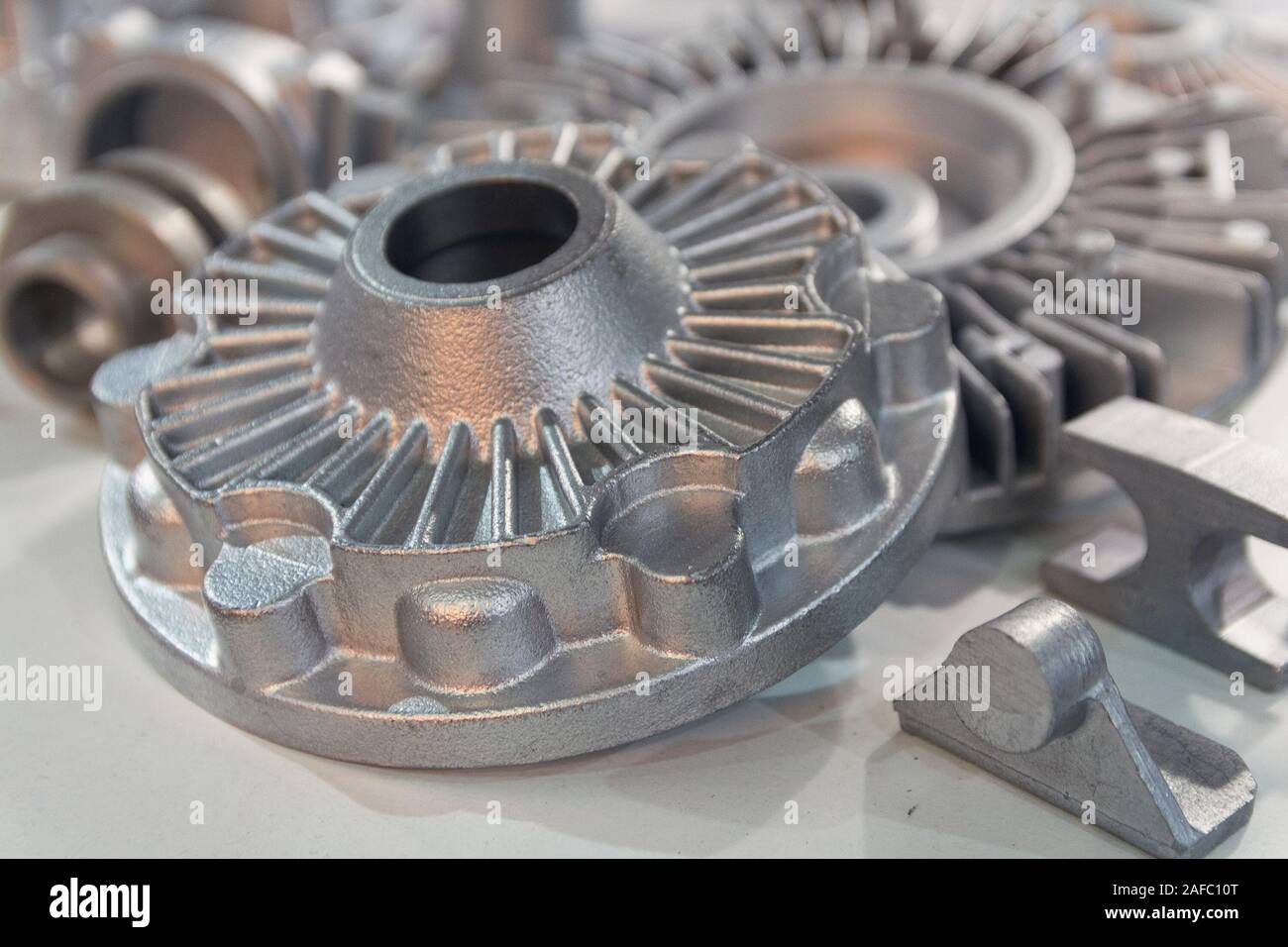 Metal products made by casting techniques closeup. Industry Stock Photo