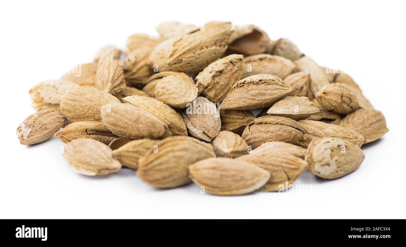 Roasted and salted Almonds (in the shell) isolated on white background