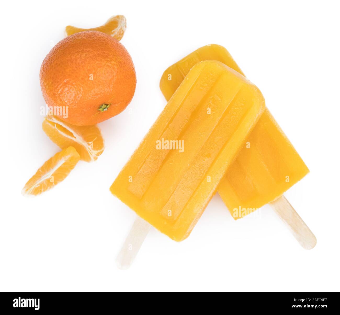 Tangerine Popsicles isolated on a white background (detailed close-up shot) Stock Photo