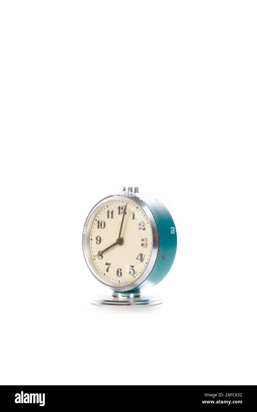 vintage clock with alarm isolated on white background Stock Photo - Alamy