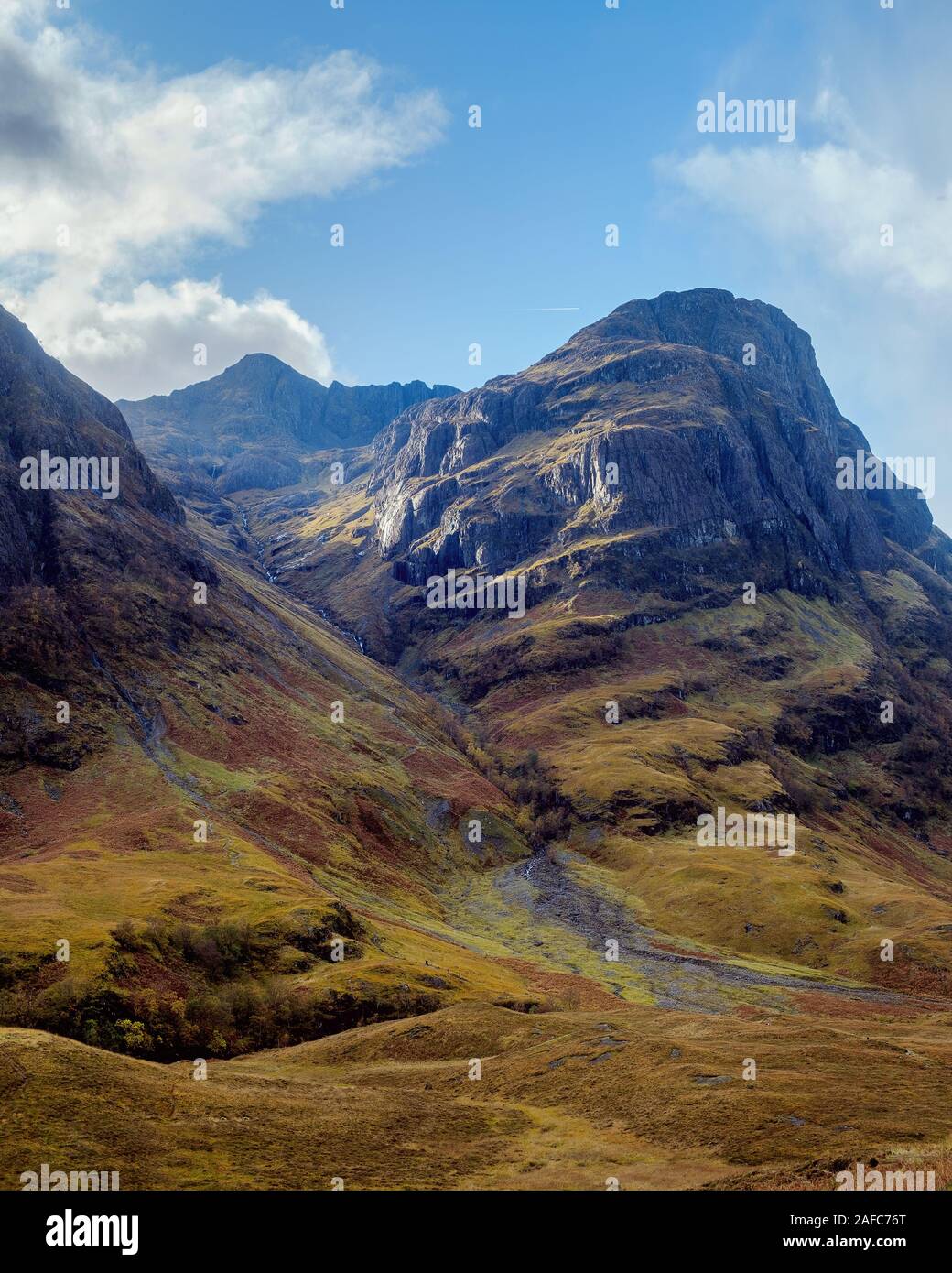 Autumn colors of the Scottish mountains and mountain stream in Glencoe, Scotland, UK. Stock Photo